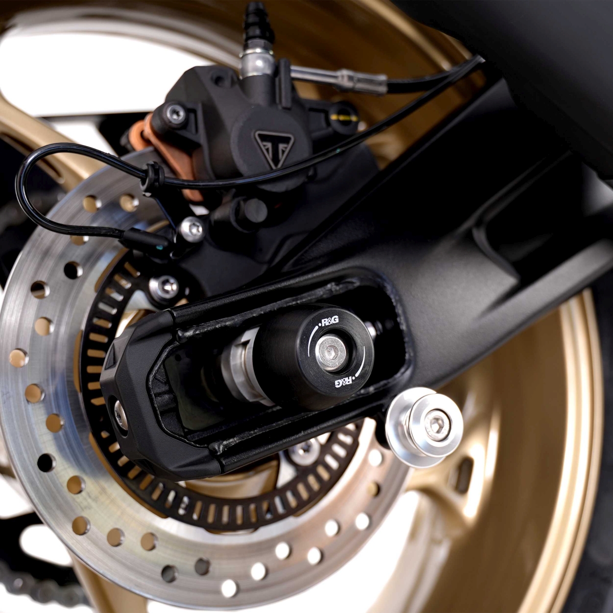(imagen para) Topes Basculante APEX - Triumph Street Triple 765 RX 2026+, 765 S 2017-2020, 765 R/RS 2017+, 765 Moto2 2023+, 660 S 2017-2022 / Scrambler 1200X/XC/XE 2021+